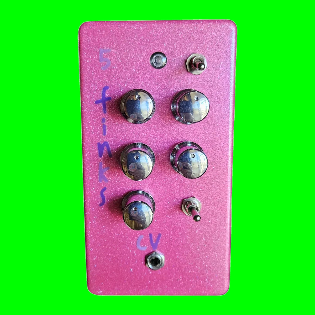 A sparkly hot pink box stood upright, seen face on. 5 finks is hand-lettered in purple down the left edge. An indicator LED and a small toggle sit at the top, four chrome knobs in two rows of two below them, a fifth chrome knob with a second toggle beside it, cv lettered underneath and one small jack at the bottom.