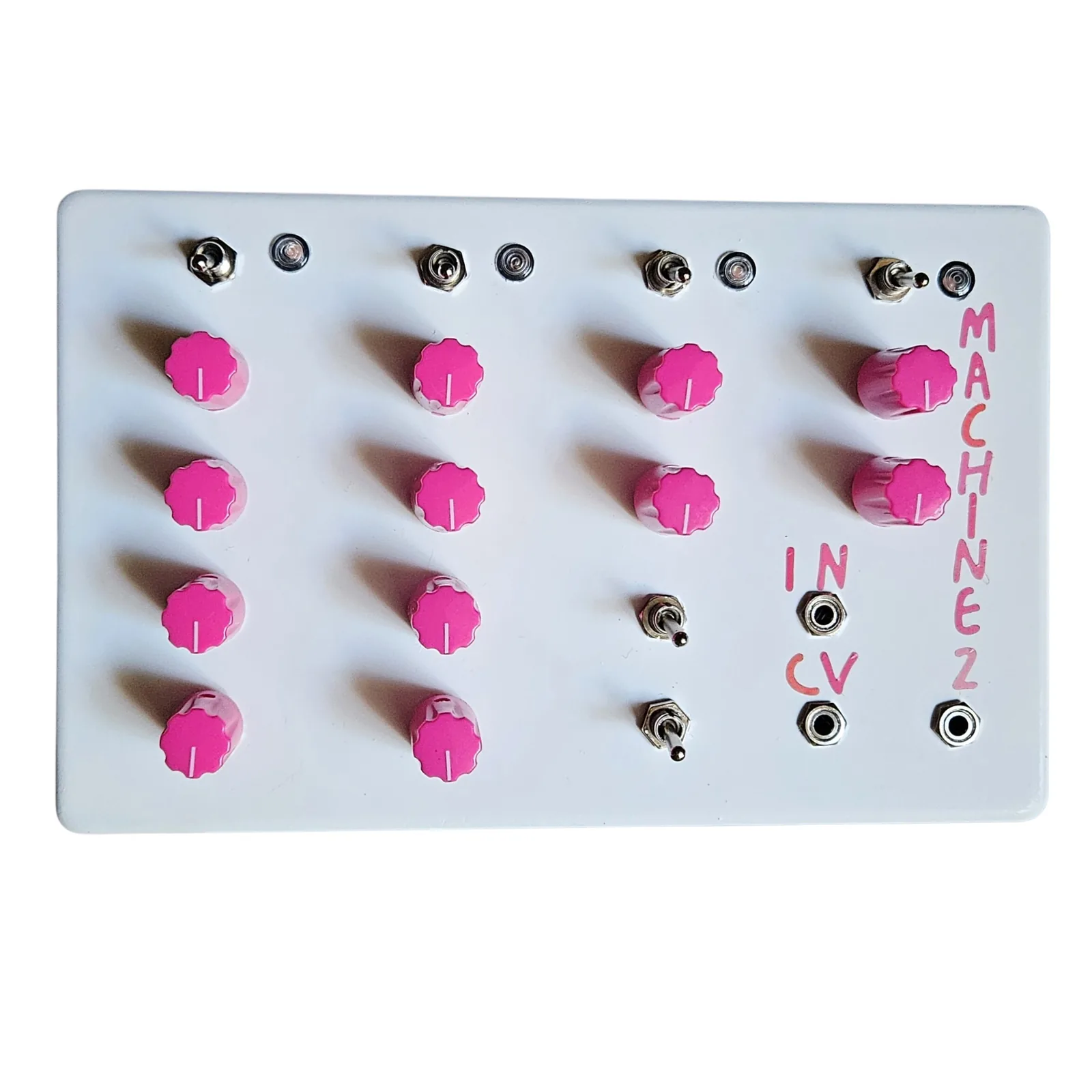A wide white box lying flat, seen face on. Twelve hot pink knobs stand in four columns: four in each of the first two, two in the third above two small toggles, and two in the fourth. A row of four small toggles runs across the top with a round LED beside each. MACHINE 2 is hand-lettered in pink down the right edge, and IN and CV are lettered beside two jacks at the lower right, with a third jack in the corner.
