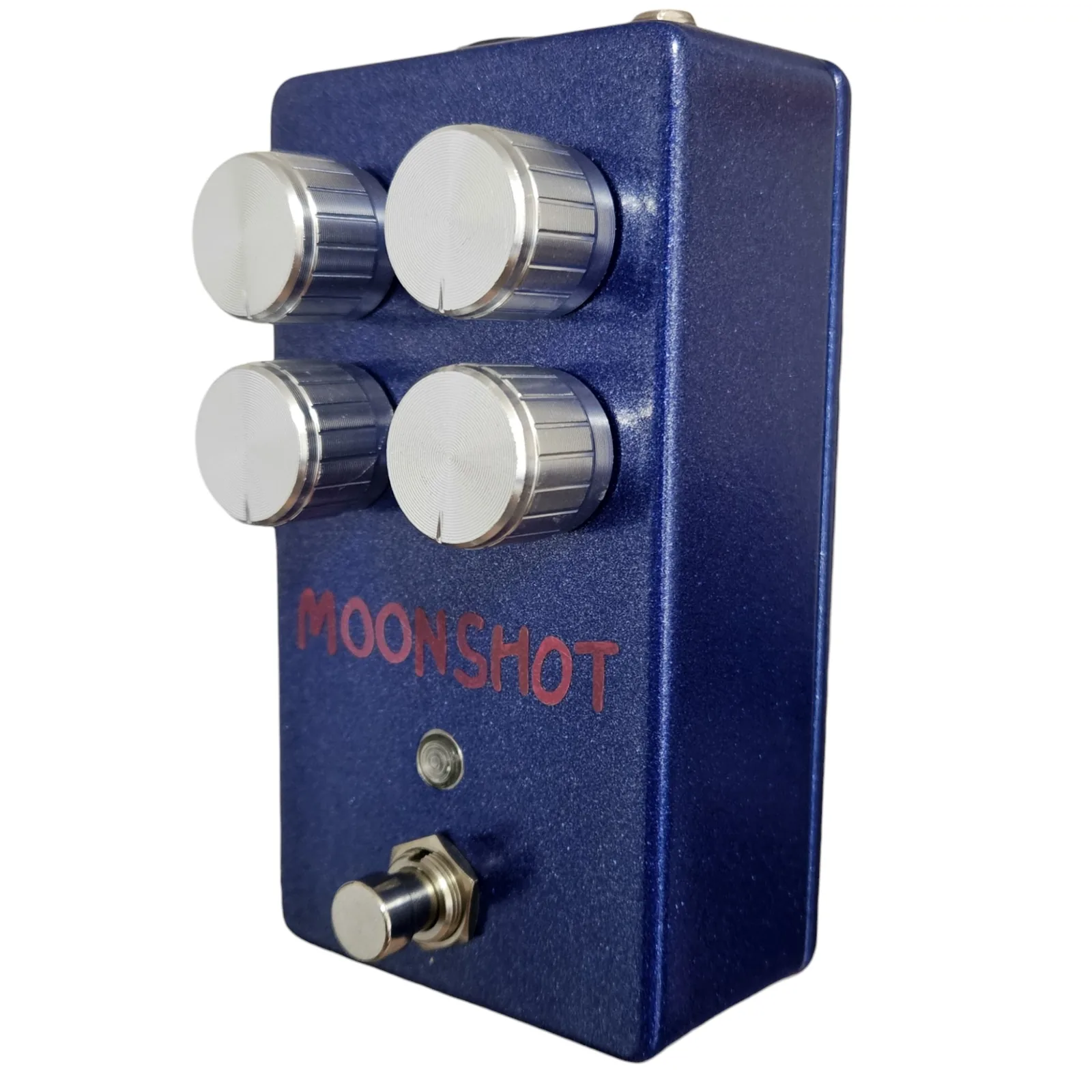 The same pedal from the other side, showing the four silver knobs in profile, the red MOONSHOT lettering, the indicator and the footswitch, with a jack just visible on the top edge.
