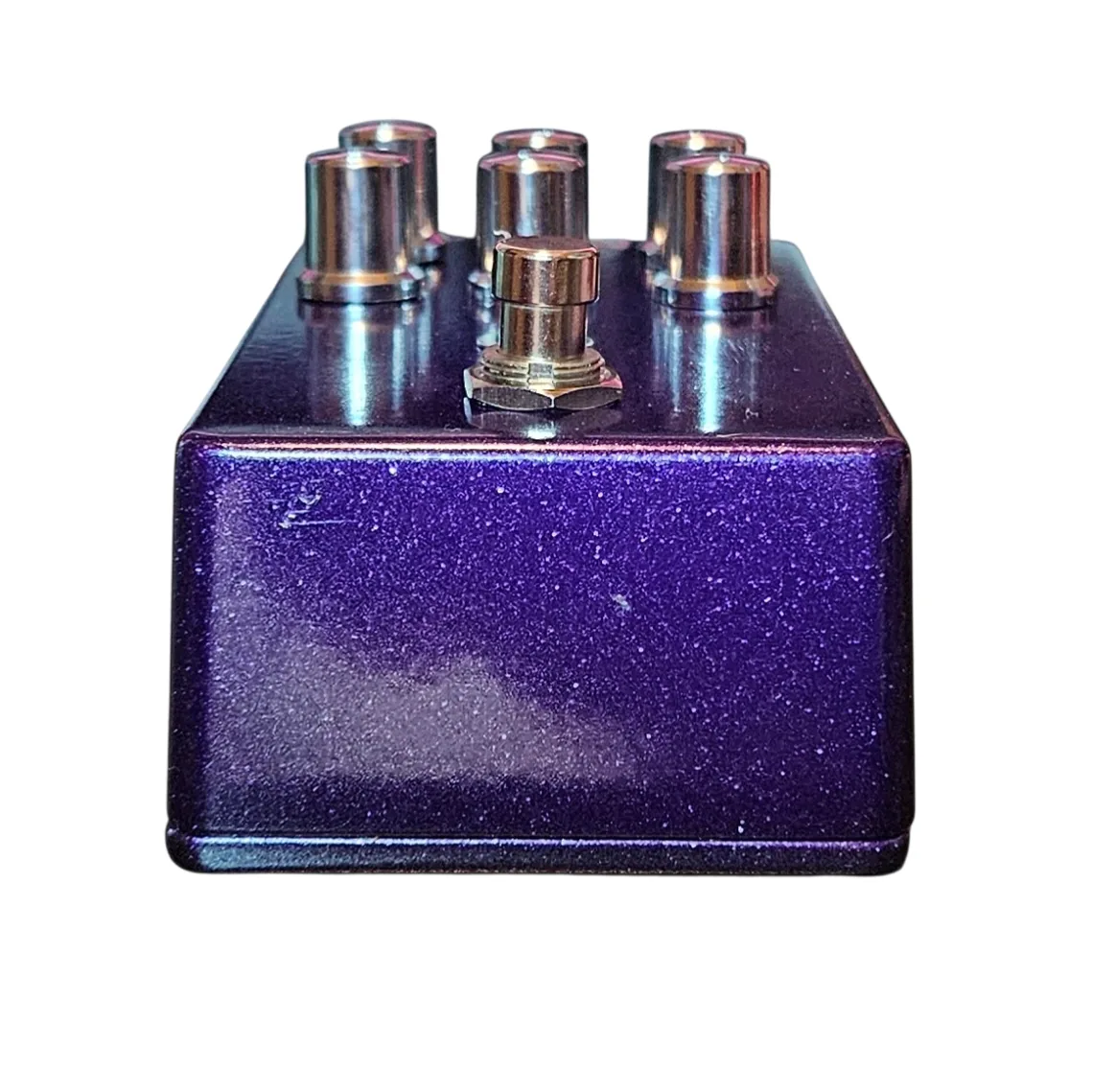 Mr. Ownz pedal, top-edge view looking down at the 1/4-inch input and output jacks and the DC power jack.