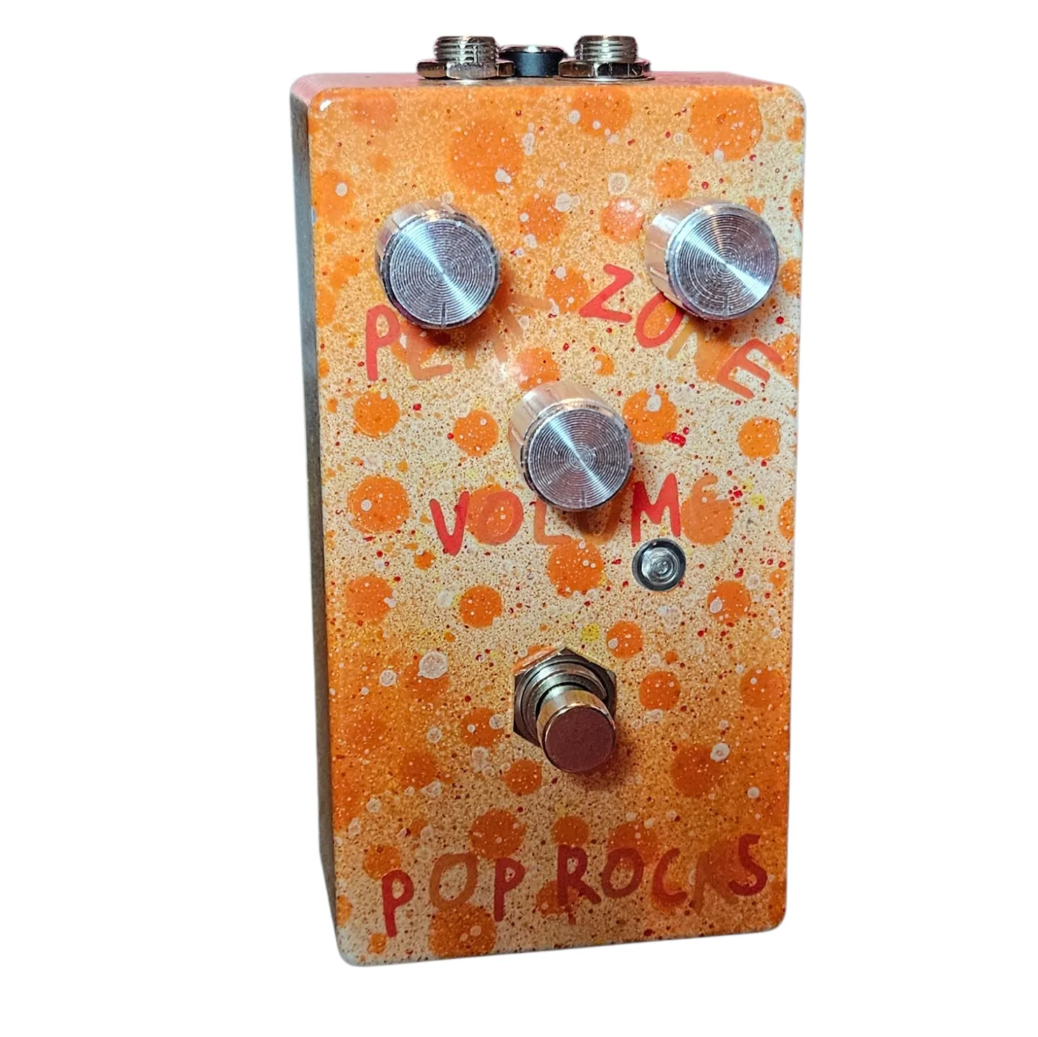 Pop Rocks pedal, front view - orange-fizz speckled enclosure with pink Peak, Zone, and Volume knobs.