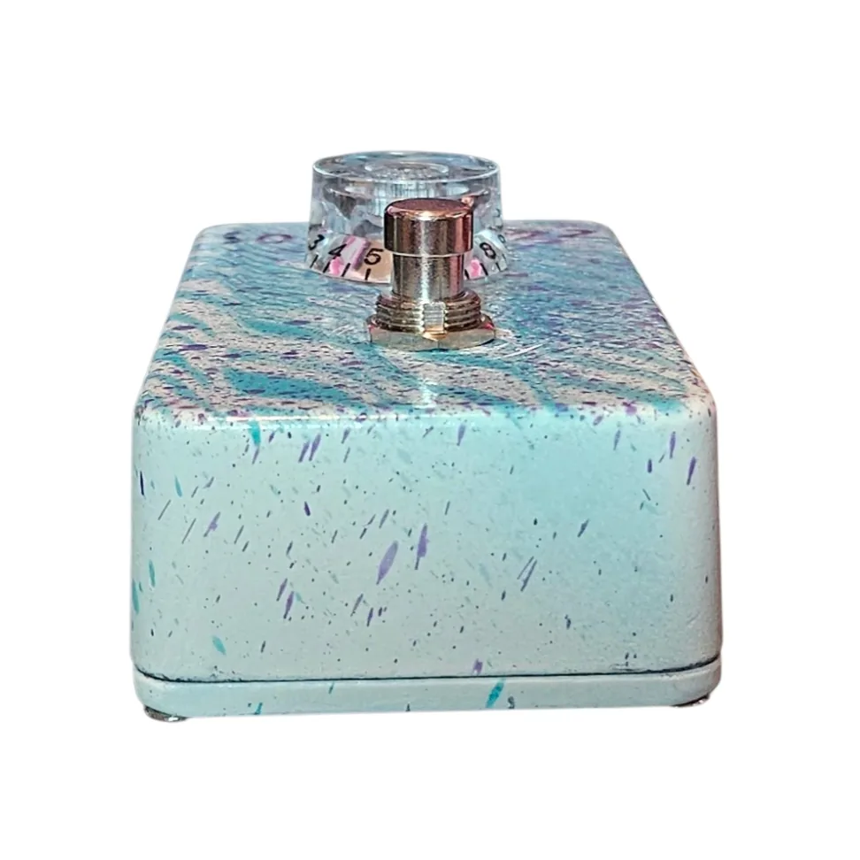 Top-down view of the enclosure: a 1/4-inch jack sits at each corner of the top edge with a black DC power jack between them, and the jacks carry no legible labels. Hand-lettered purple "solo fuzz" sits above the single clear knob.