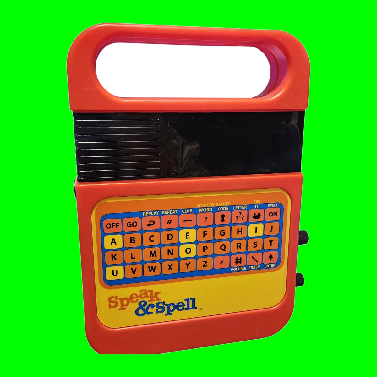 A red Texas Instruments Speak and Spell held up in one hand, its green display lit and its keypad untouched
