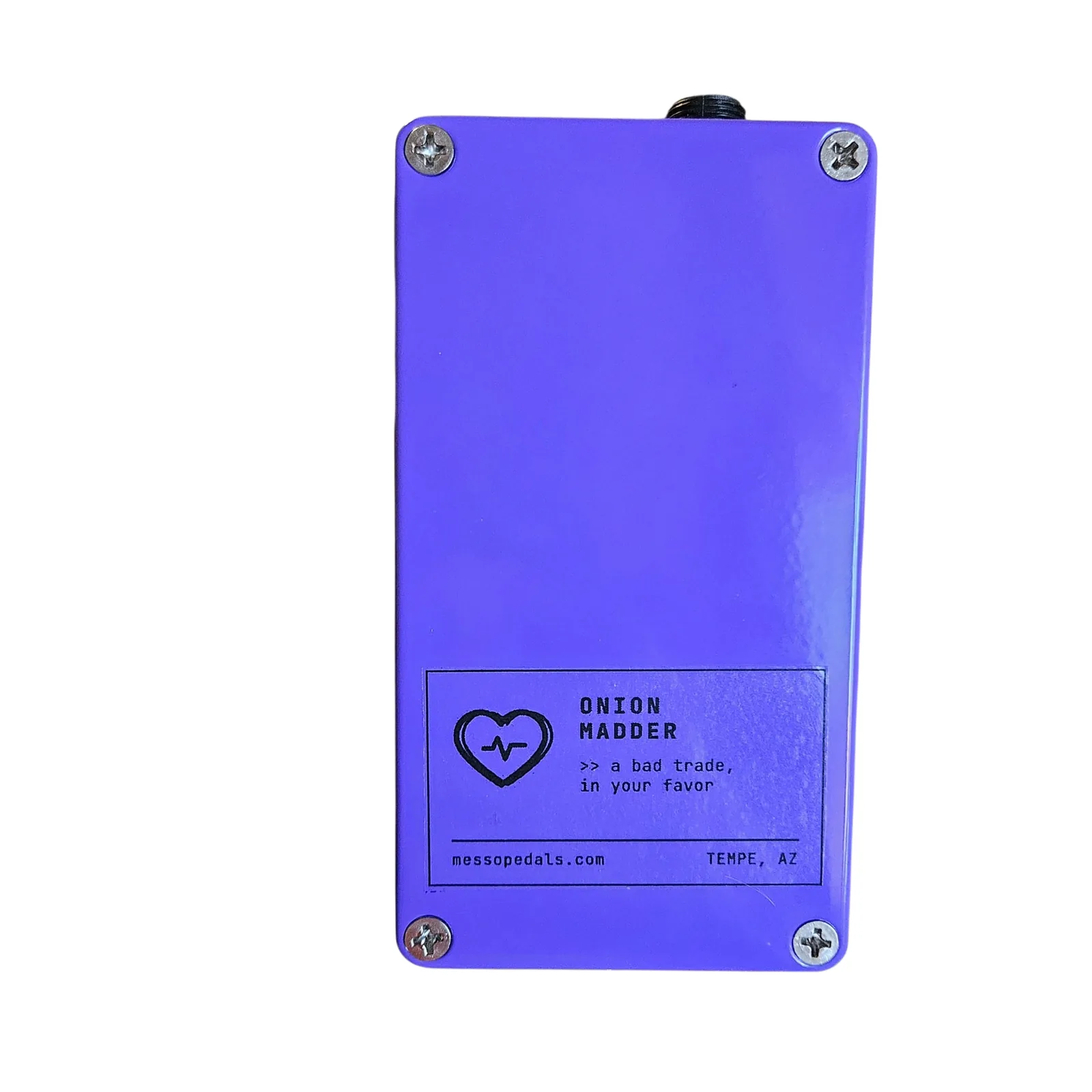 The back plate, purple with a screw at each corner, and a printed label along the bottom: a heart with a heartbeat line, ONION MADDER, a bad trade, in your favor, messopedals.com and TEMPE, AZ.