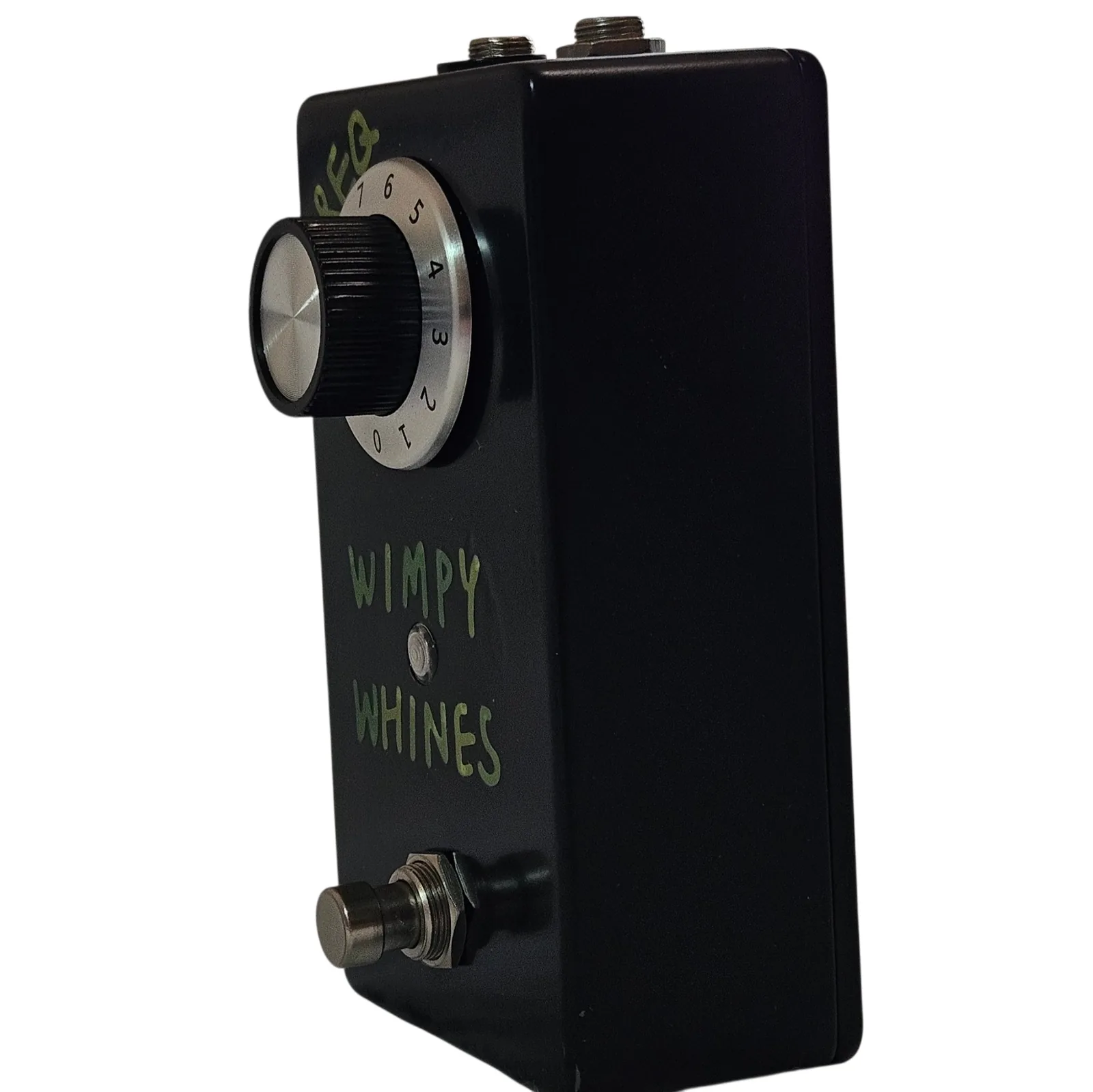 The pedal from the opposite three-quarter angle, the knob and its numbered dial in the foreground and the green lettering falling away behind, with the footswitch at the bottom edge.